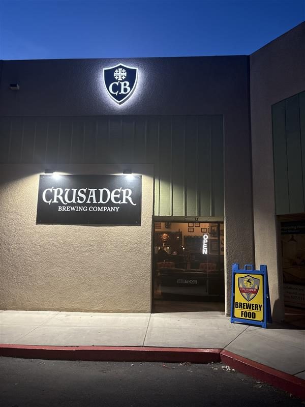 Mugs behind the bar at Crusader Brewing